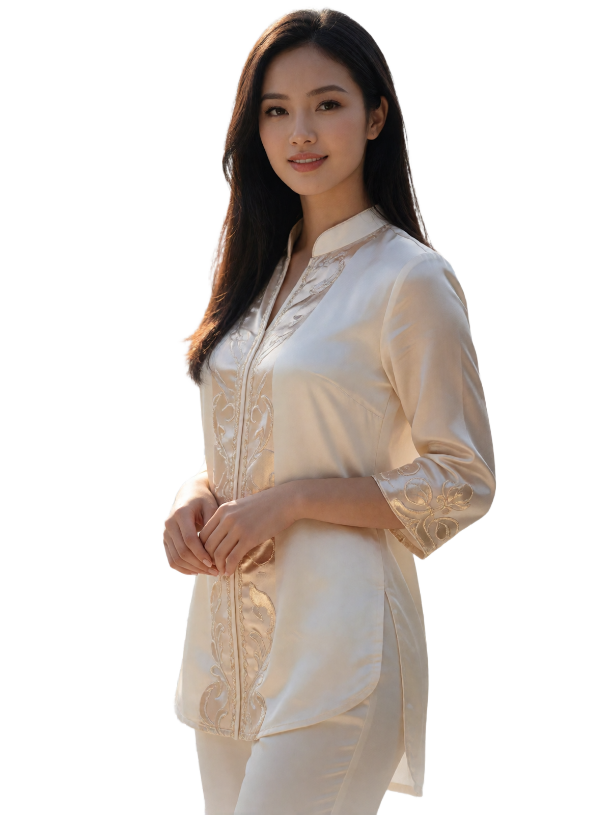 Graceful Vietnamese woman in an ivory silk tunic with champagne detailing, smiling with natural confidence